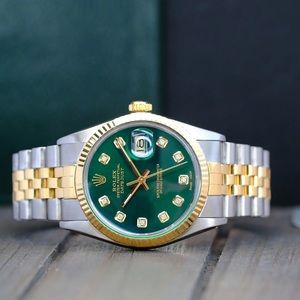 ROLEX MENS DATEJUST TWO-TONE
GREEN DIAL 18KY GOLD FLUTED BEZEL
36MM WATCH 16013